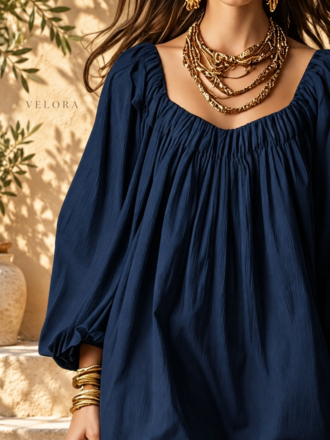 VELORA balloon sleeve dress photo 8 with Mediterranean backdrop