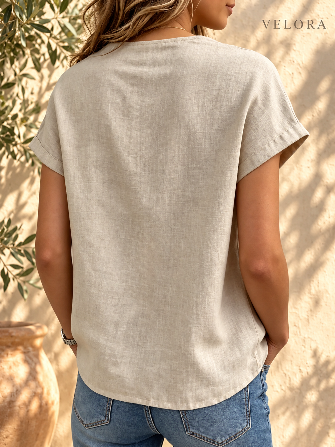 VELORA bow tie blouse look 2 on Mediterranean plaster