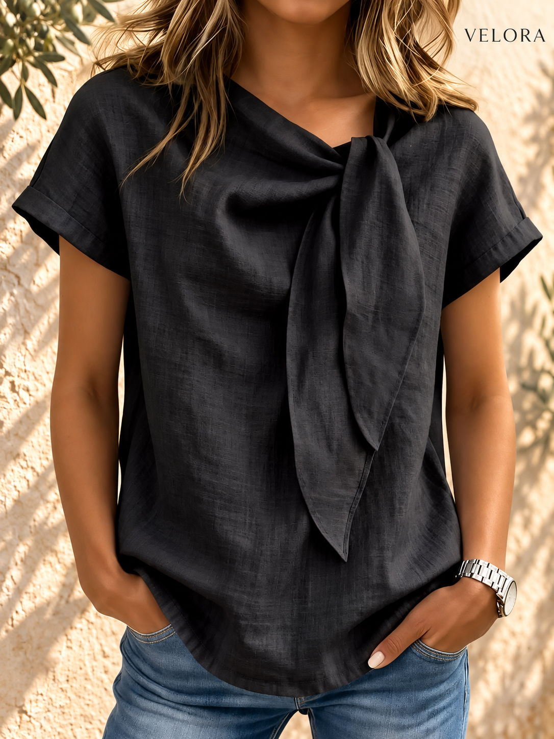 VELORA bow tie blouse look 3 on Mediterranean plaster