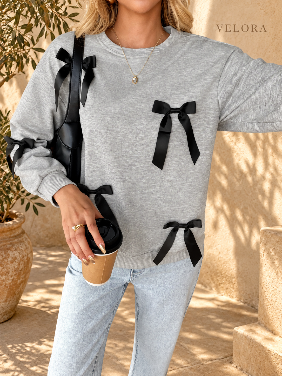 VELORA bow sweatshirt detail 3 on Mediterranean plaster