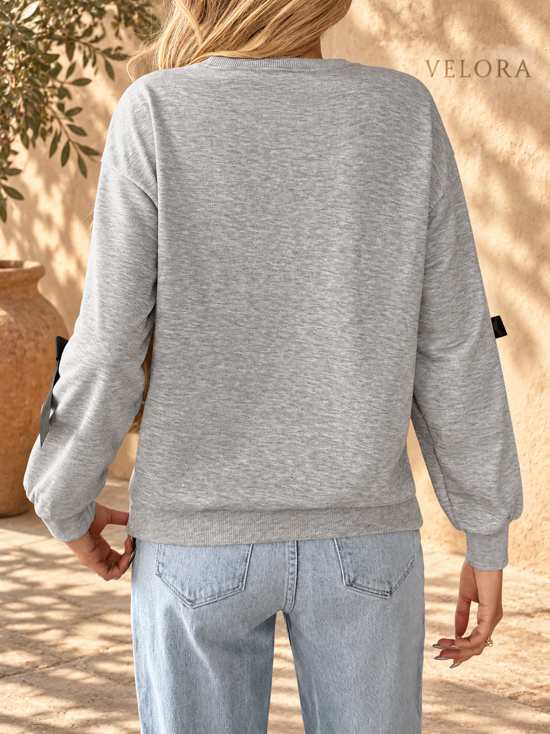 VELORA bow sweatshirt detail 6 on Mediterranean plaster