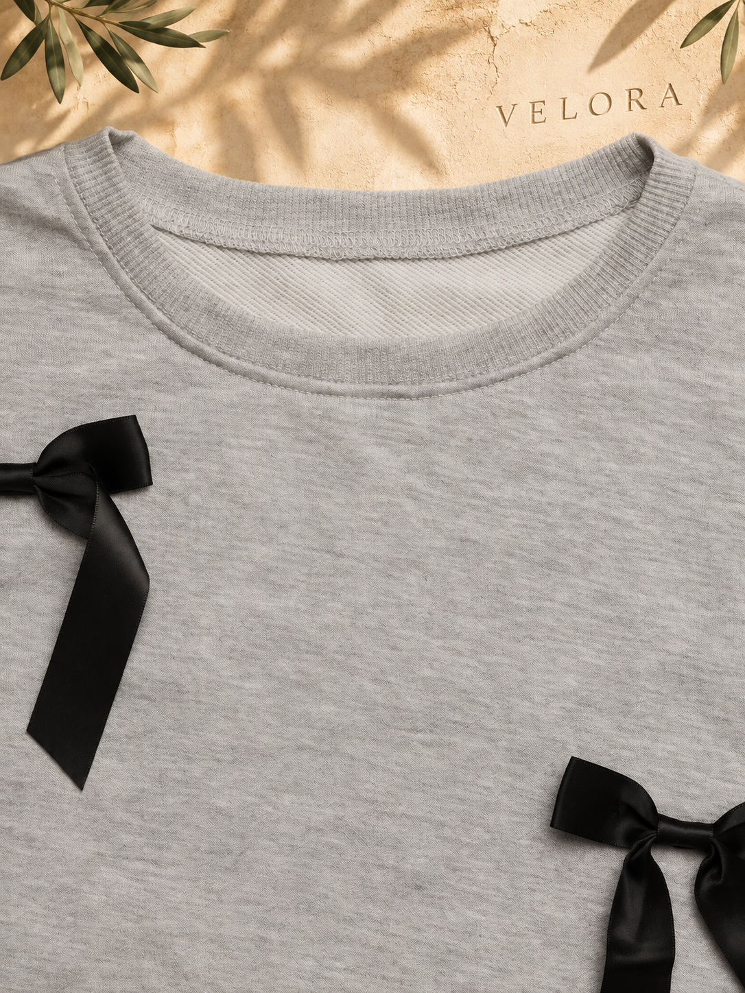 VELORA bow sweatshirt detail 7 on Mediterranean plaster