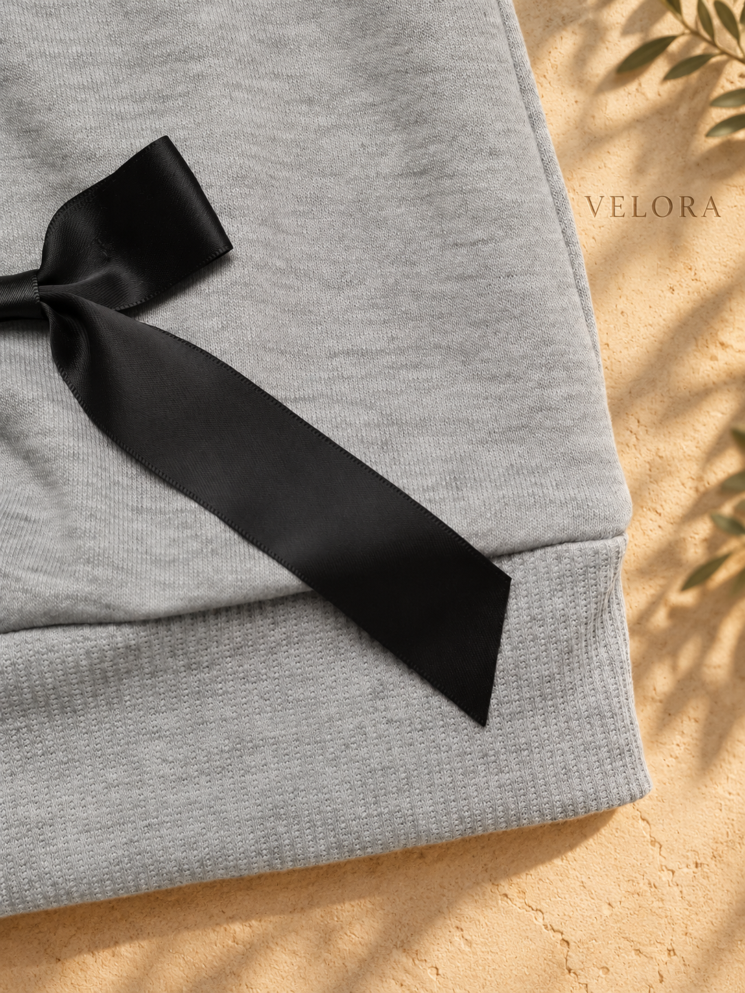 VELORA bow sweatshirt detail 8 on Mediterranean plaster