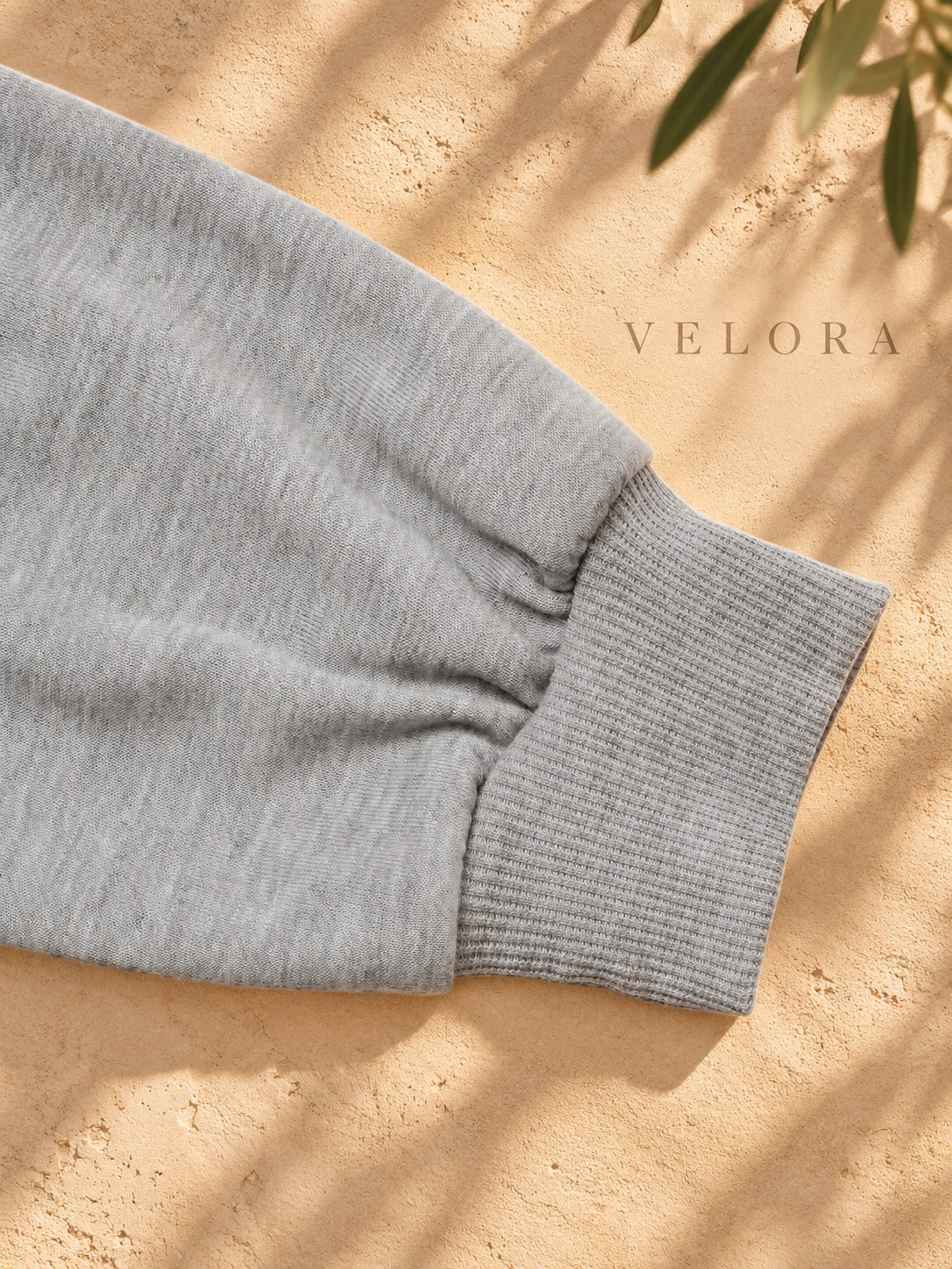 VELORA bow sweatshirt detail 10 on Mediterranean plaster