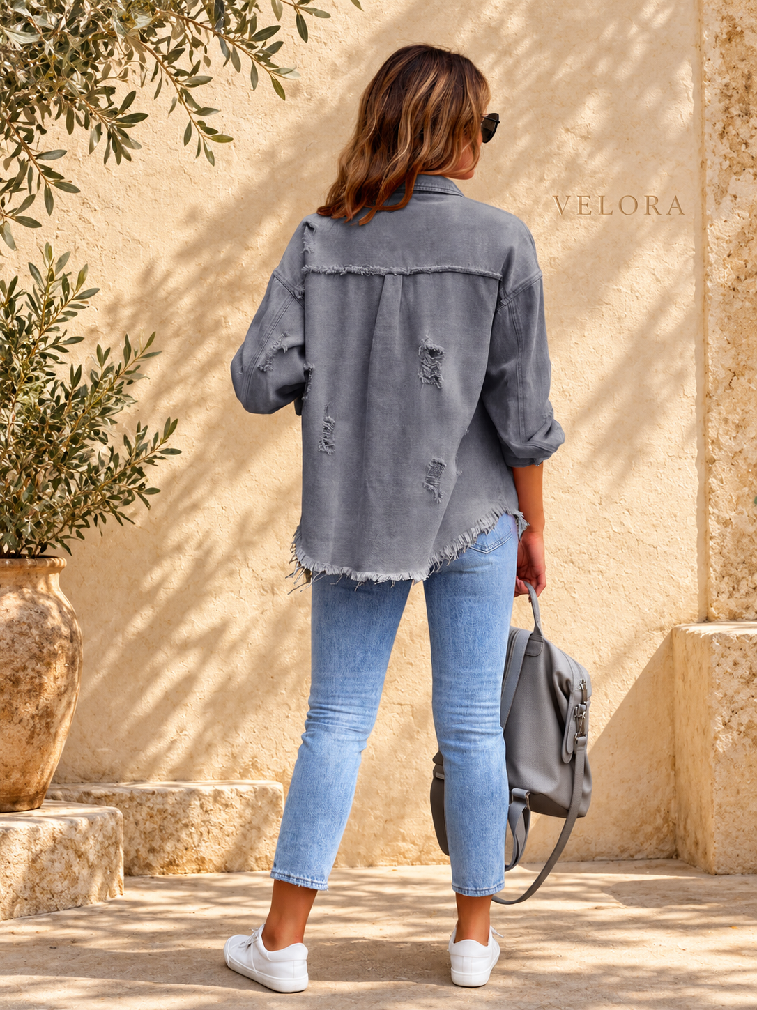 VELORA denim jacket variation 18 on warm Mediterranean plaster