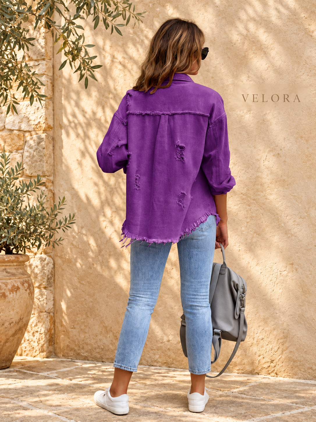 VELORA denim jacket variation 21 on warm Mediterranean plaster