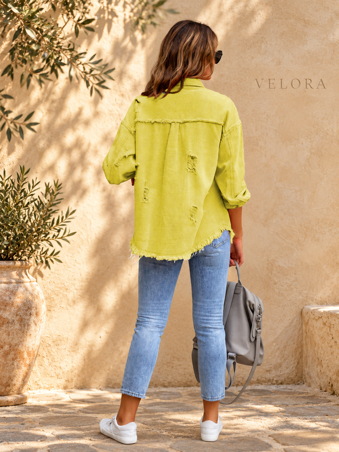 VELORA denim jacket variation 30 on warm Mediterranean plaster