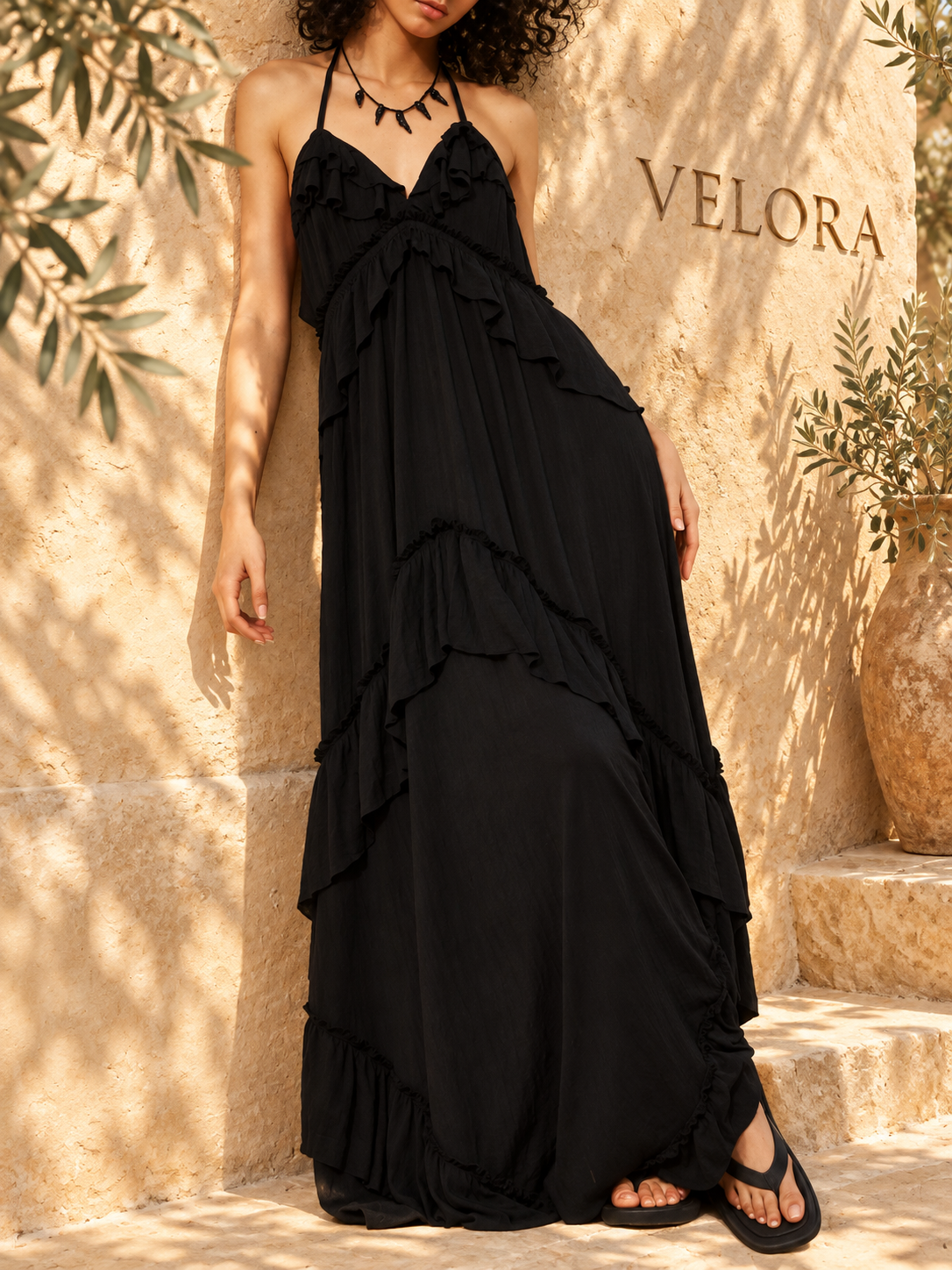 VELORA ruffled maxi dress look 11 on Mediterranean plaster