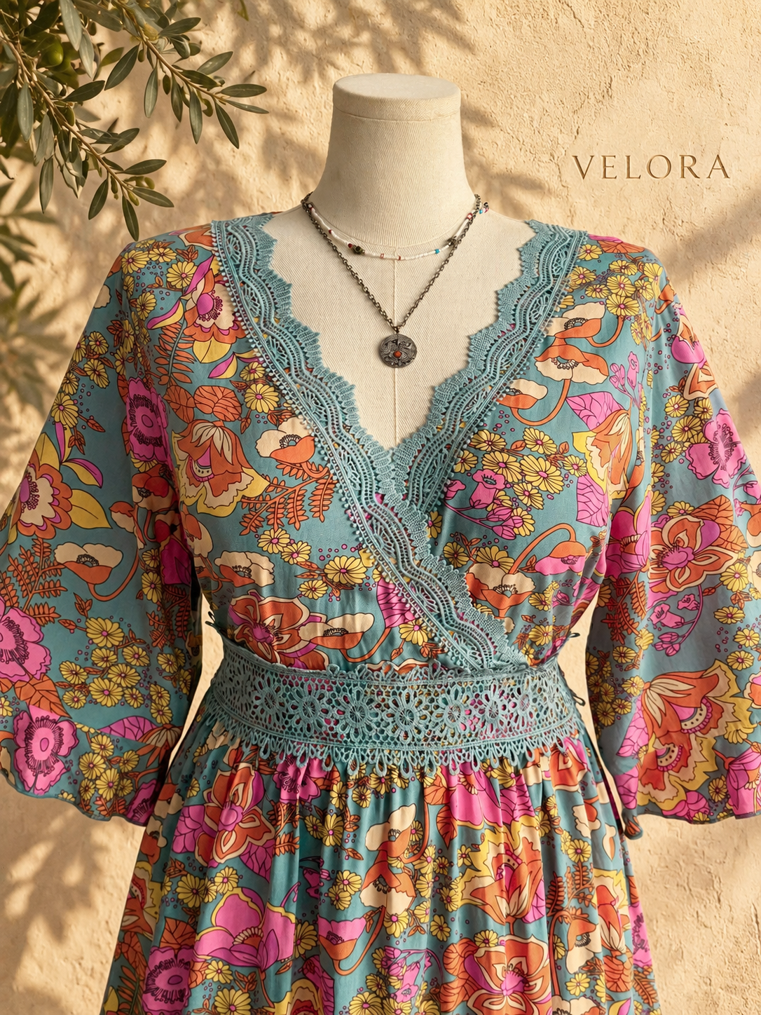 VELORA floral surplice dress look 3 on Mediterranean plaster
