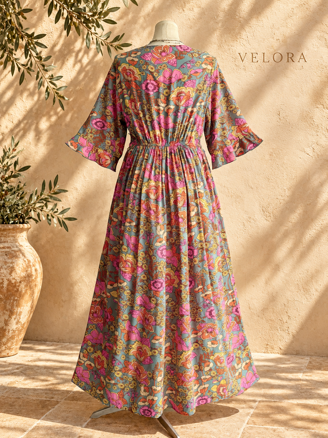 VELORA floral surplice dress look 6 on Mediterranean plaster