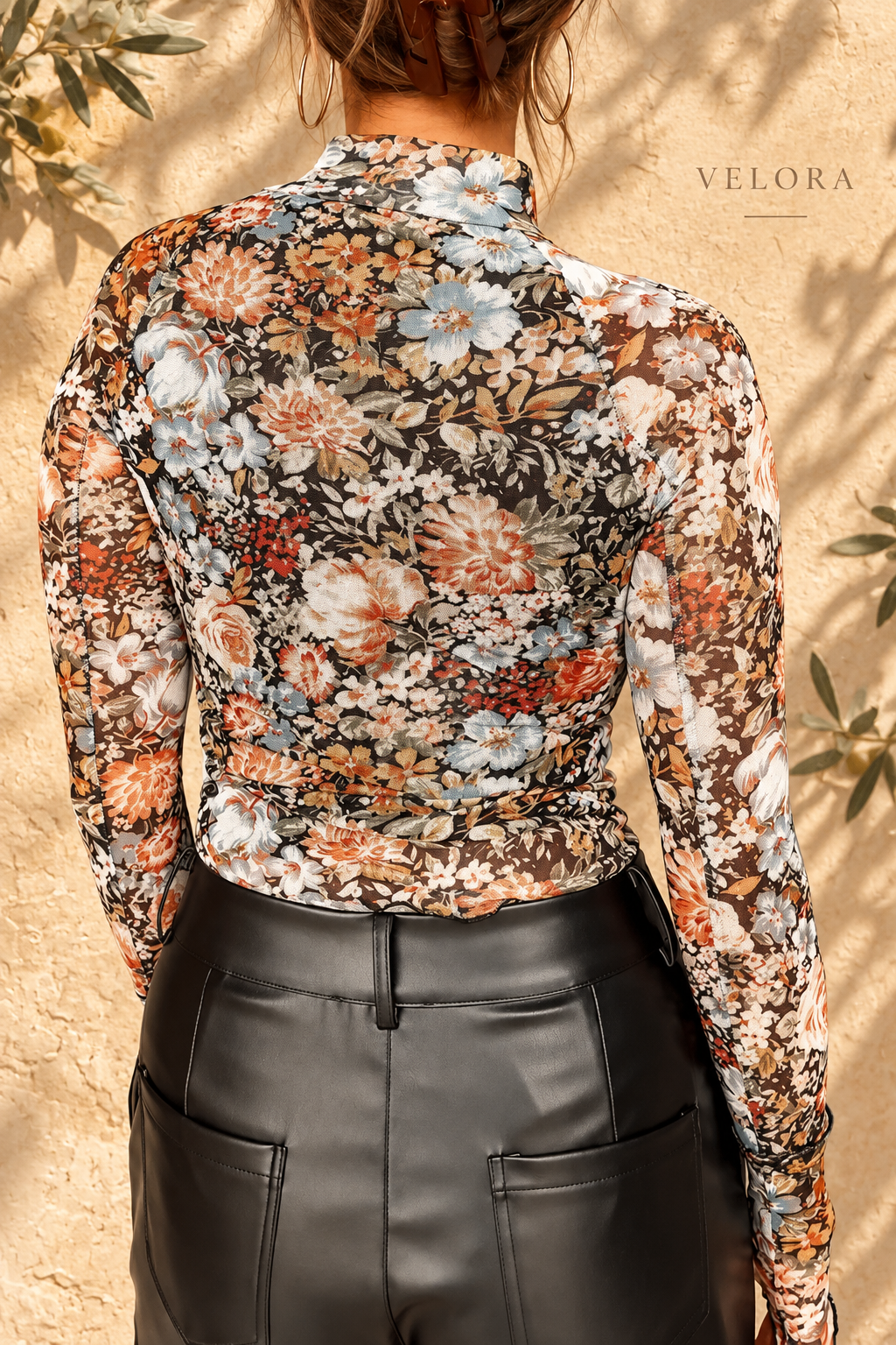 VELORA floral-top look 2 on Mediterranean plaster