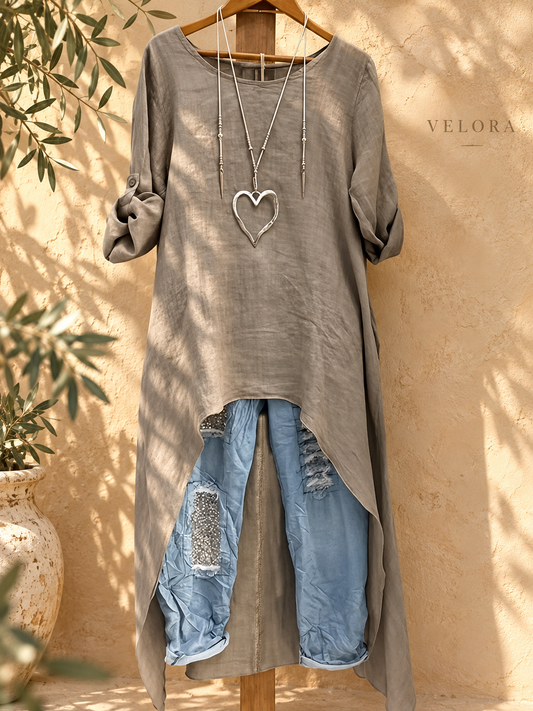 VELORA high-low-blouse look 1 on Mediterranean plaster
