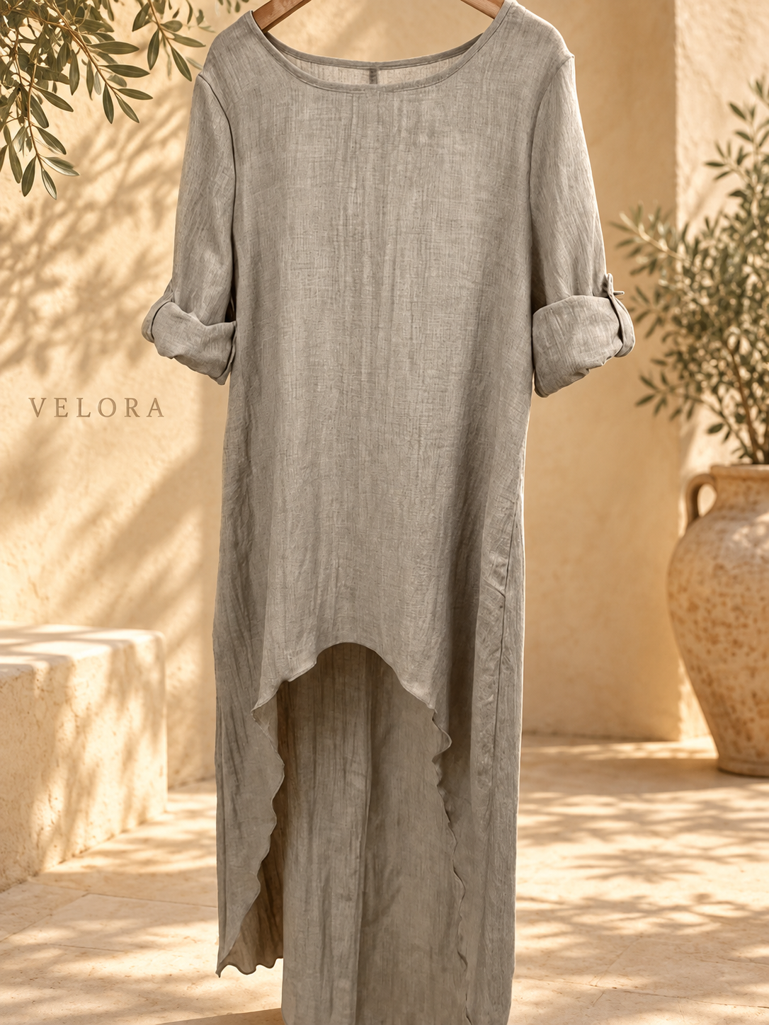 VELORA high-low-blouse look 2 on Mediterranean plaster