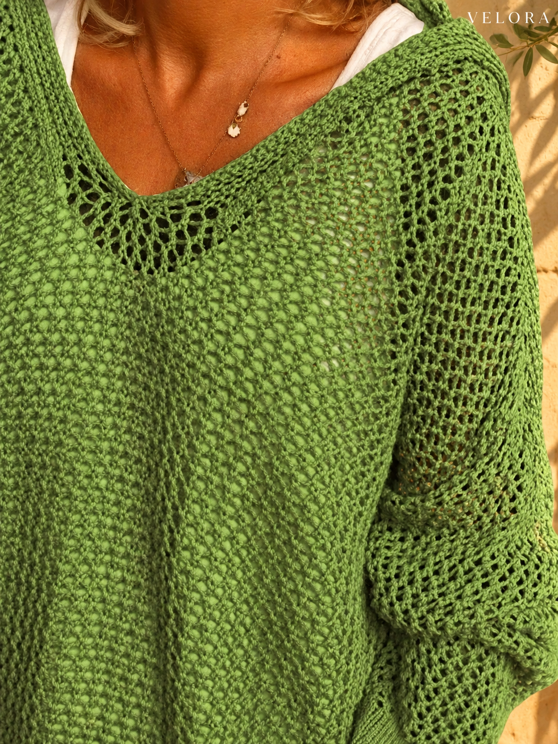 VELORA openwork knit cover-up detail 11 Mediterranean background