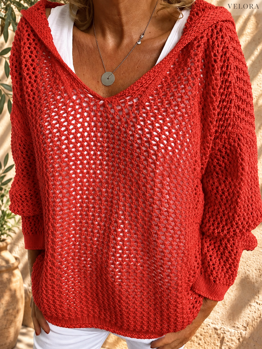 VELORA openwork knit cover-up detail 13 Mediterranean background