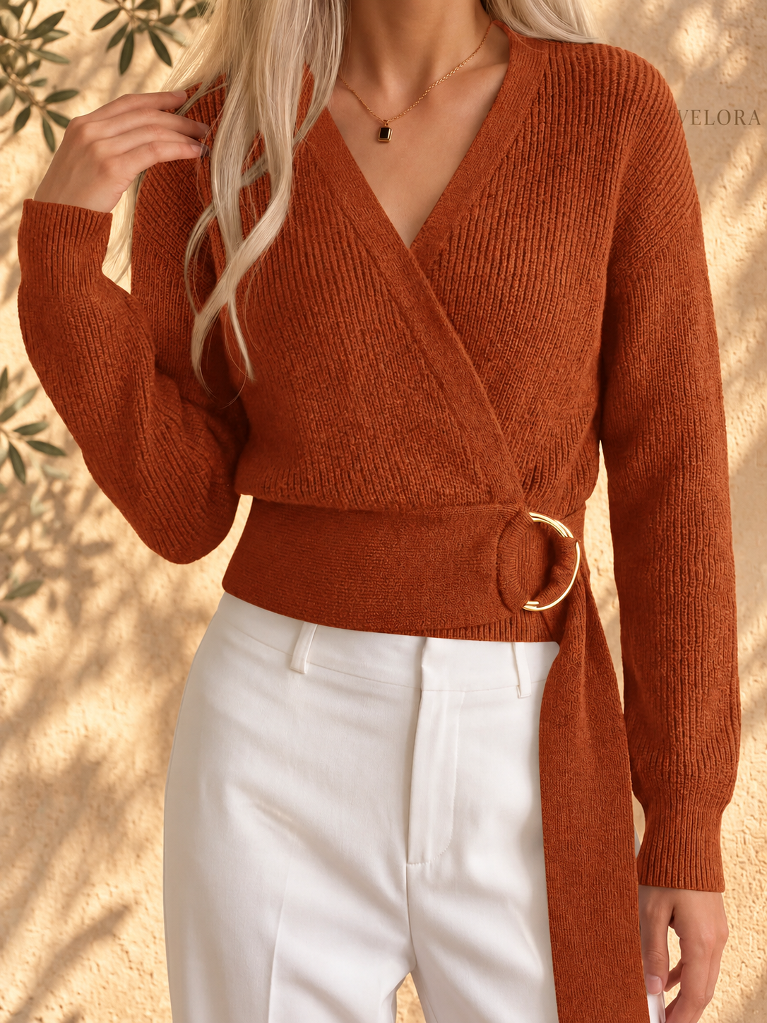 VELORA metal-ring sweater look 2 on Mediterranean plaster
