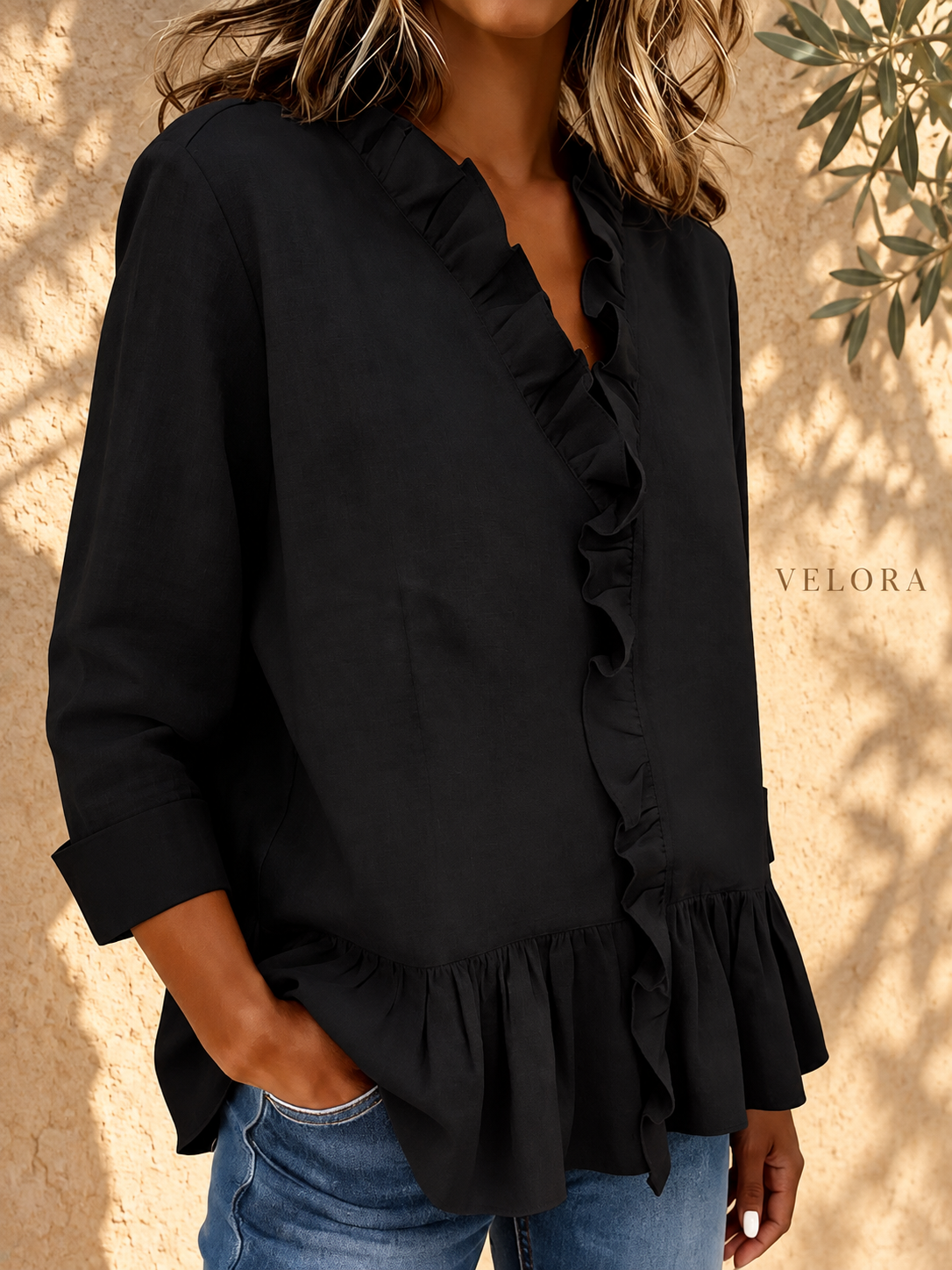 VELORA ruffled peplum blouse look 13 on Mediterranean plaster