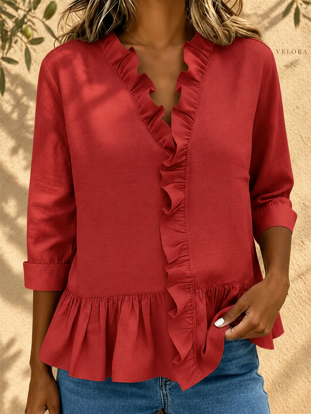 VELORA ruffled peplum blouse look 14 on Mediterranean plaster