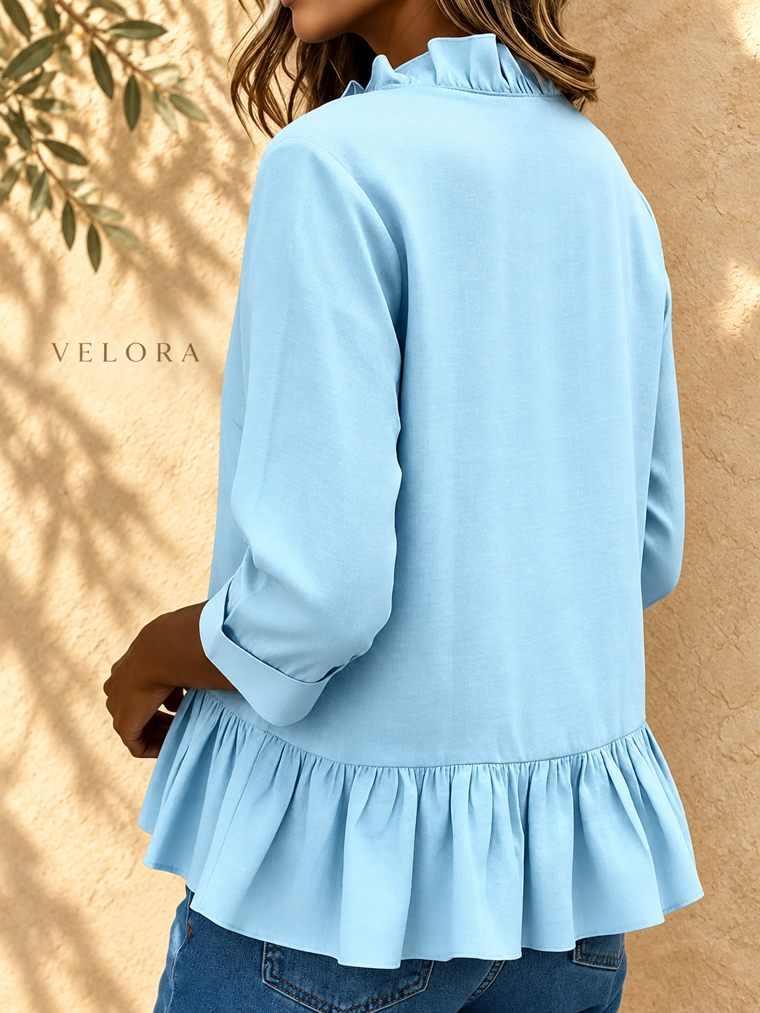 VELORA ruffled peplum blouse look 7 on Mediterranean plaster