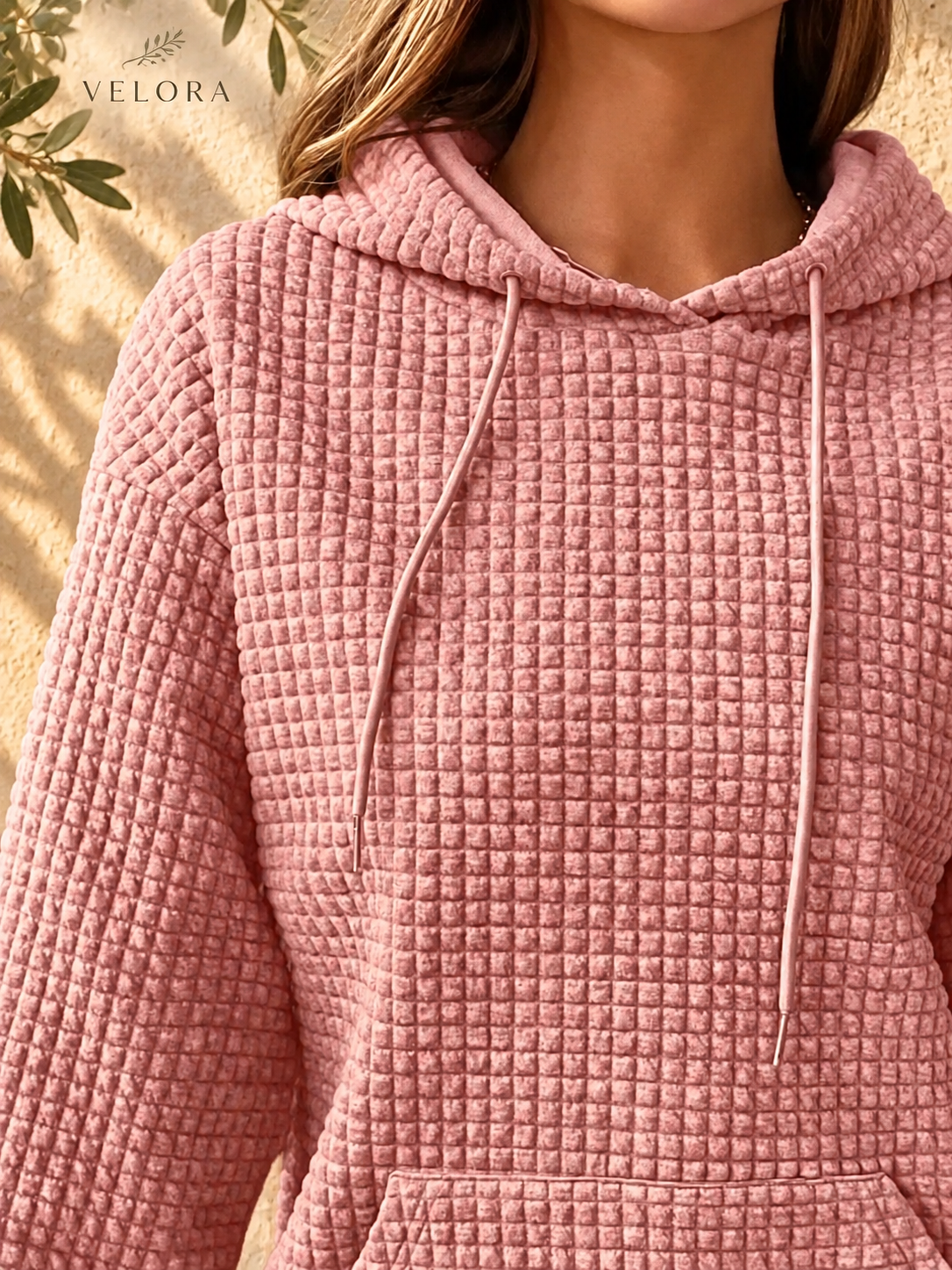 VELORA textured hoodie look 11 on warm Mediterranean plaster