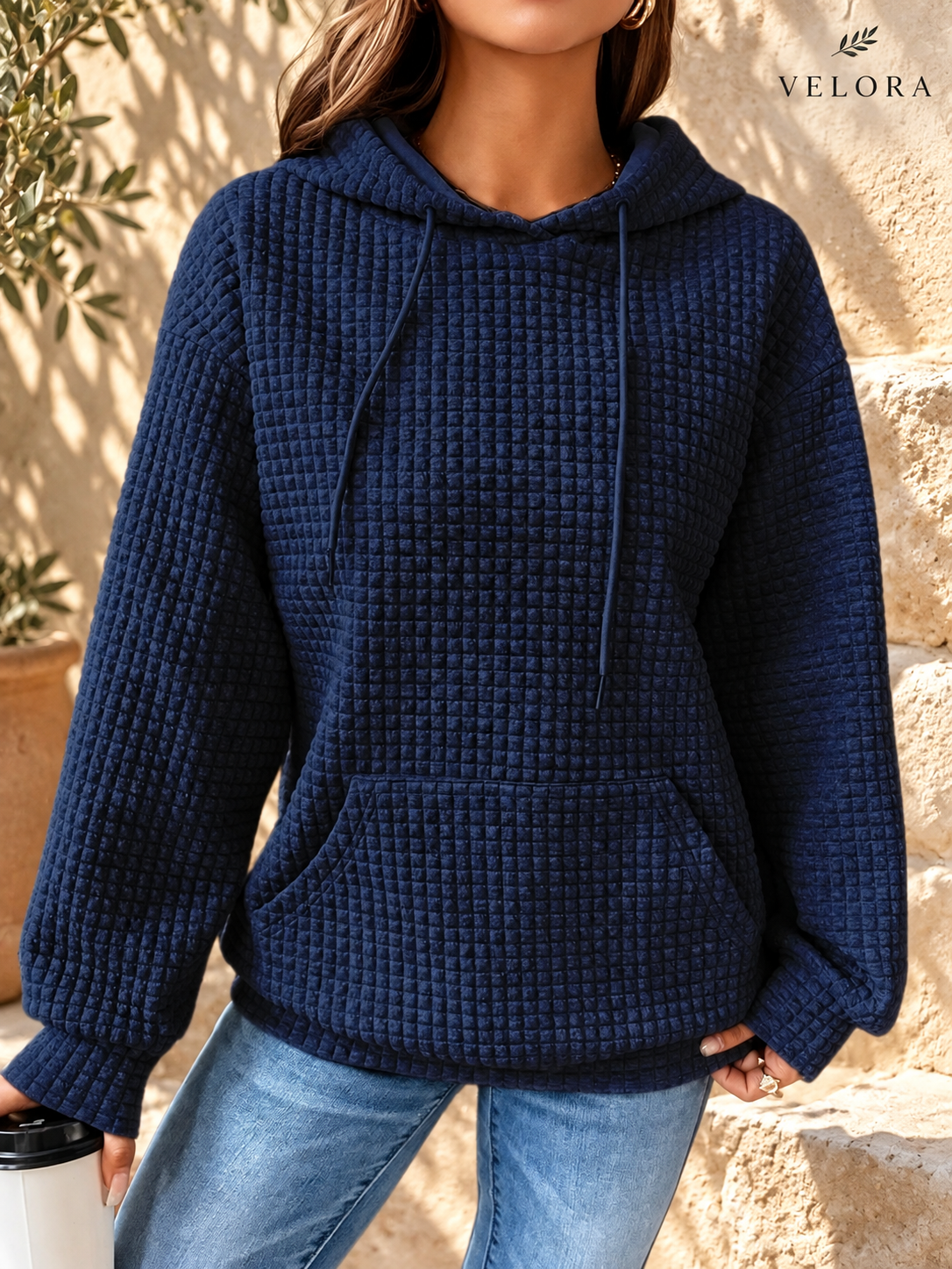 VELORA textured hoodie look 12 on warm Mediterranean plaster