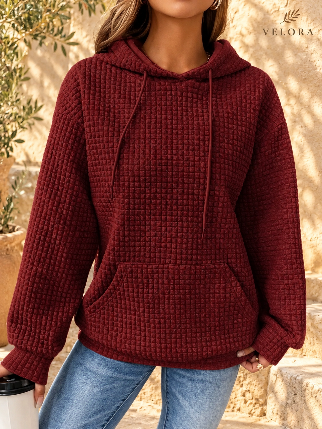 VELORA textured hoodie look 15 on warm Mediterranean plaster