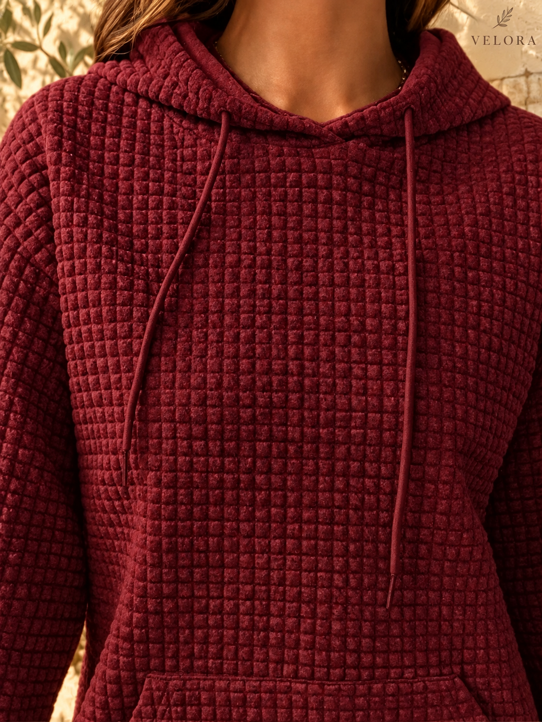 VELORA textured hoodie look 16 on warm Mediterranean plaster
