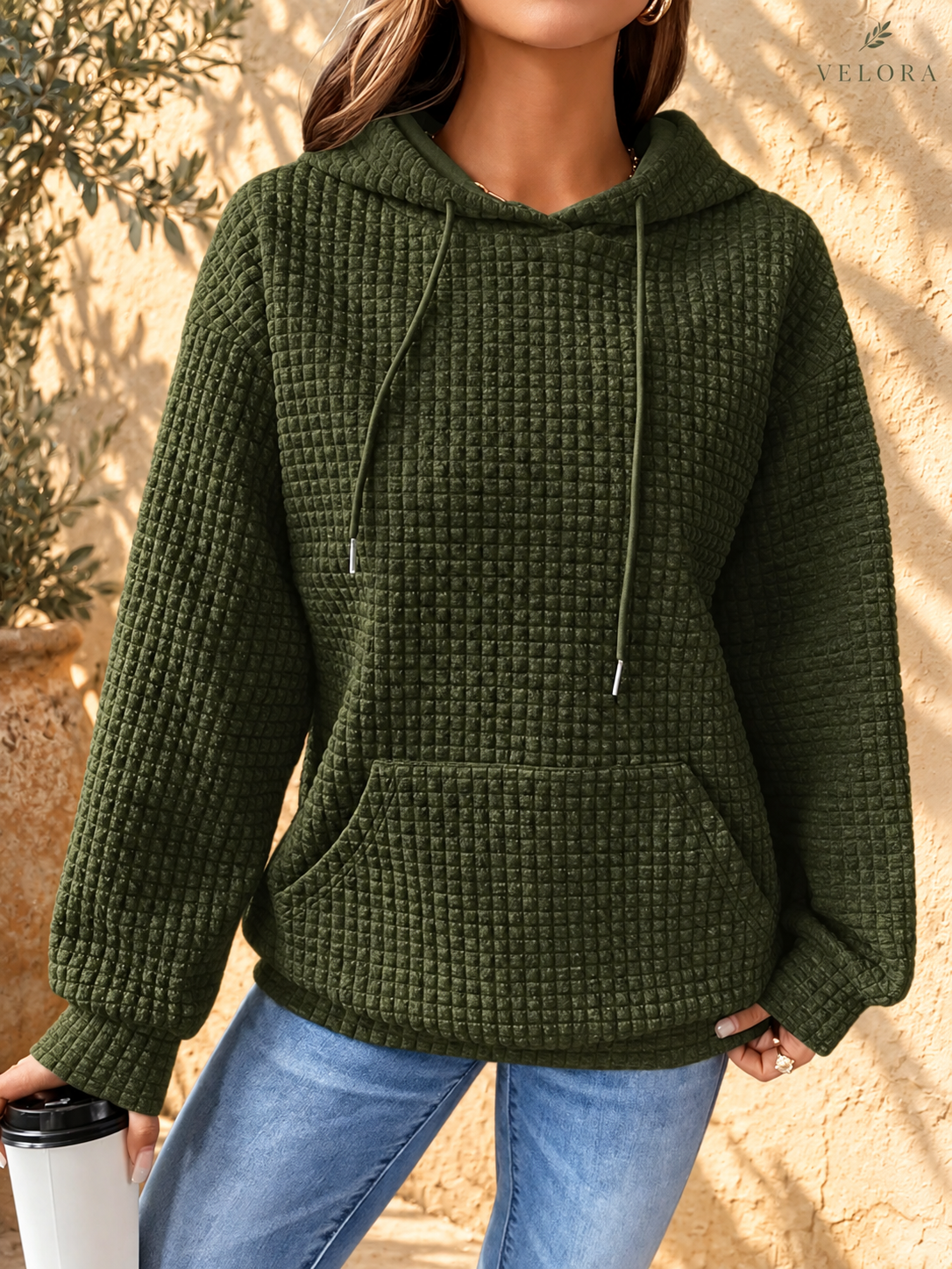 VELORA textured hoodie look 17 on warm Mediterranean plaster