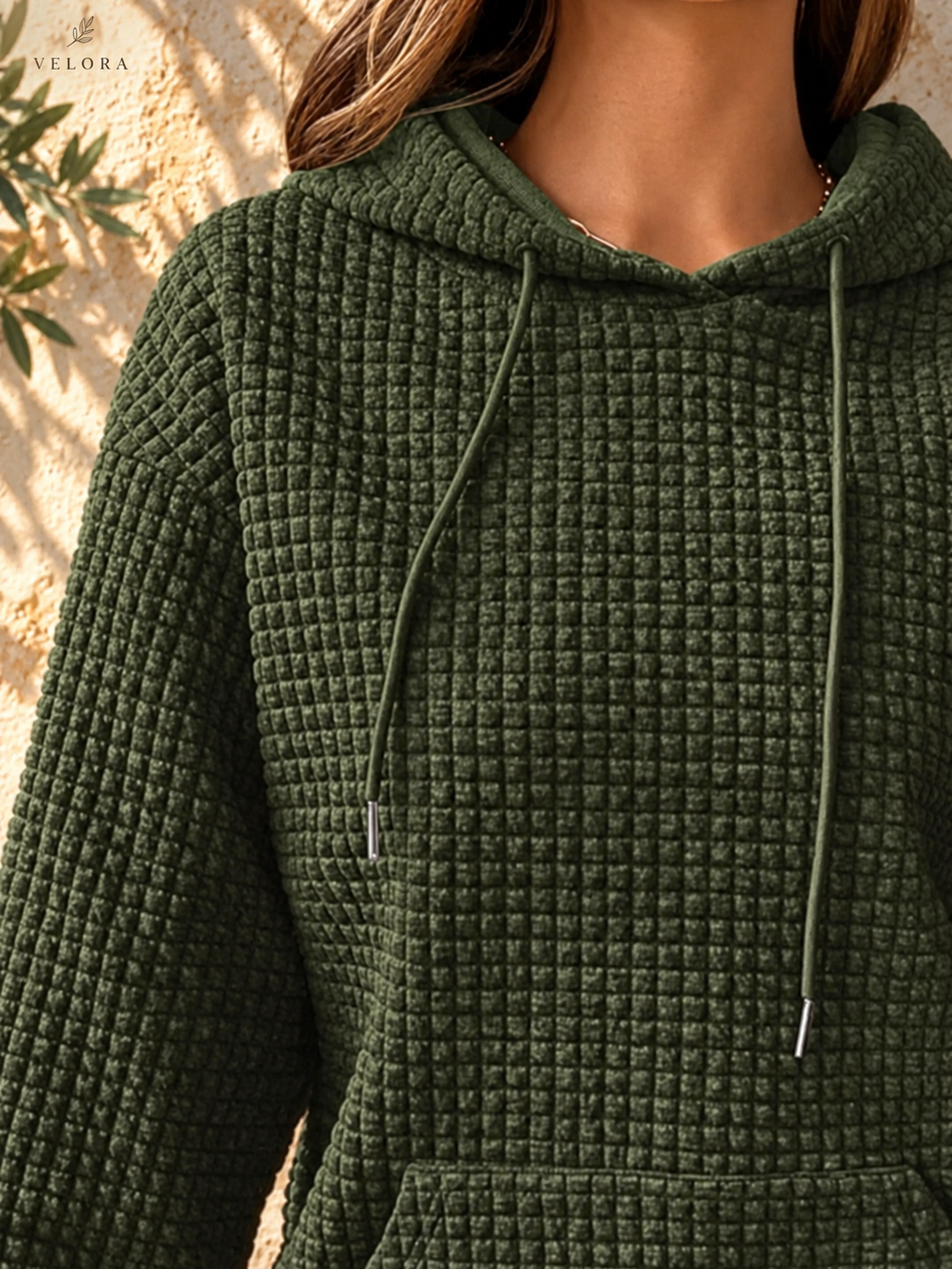 VELORA textured hoodie look 18 on warm Mediterranean plaster