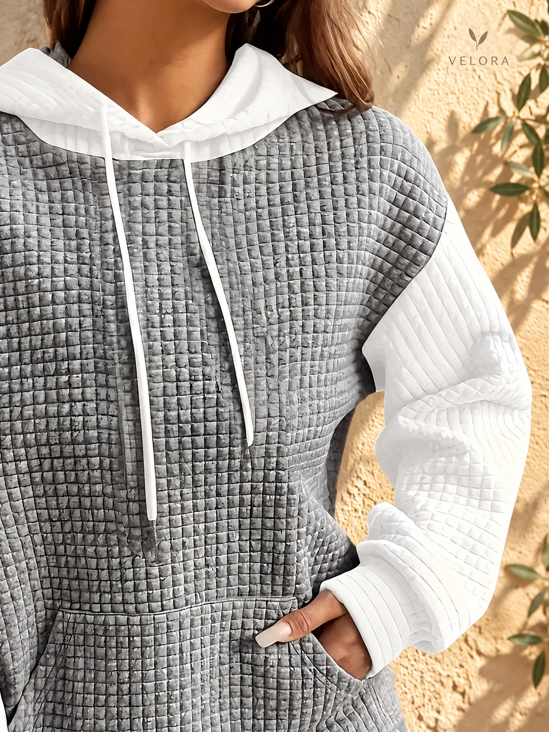 VELORA textured hoodie look 20 on warm Mediterranean plaster
