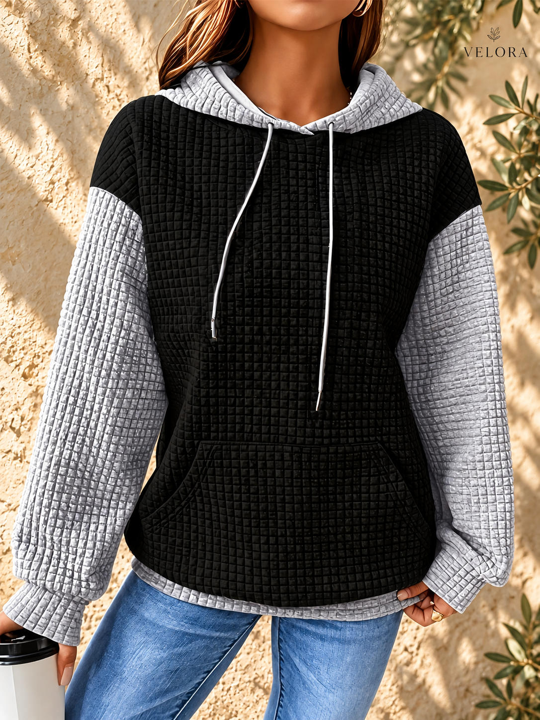 VELORA textured hoodie look 21 on warm Mediterranean plaster