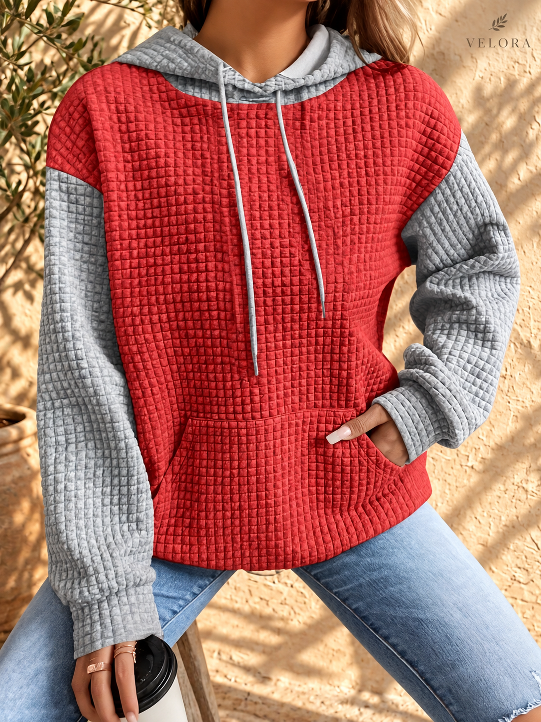 VELORA textured hoodie look 23 on warm Mediterranean plaster