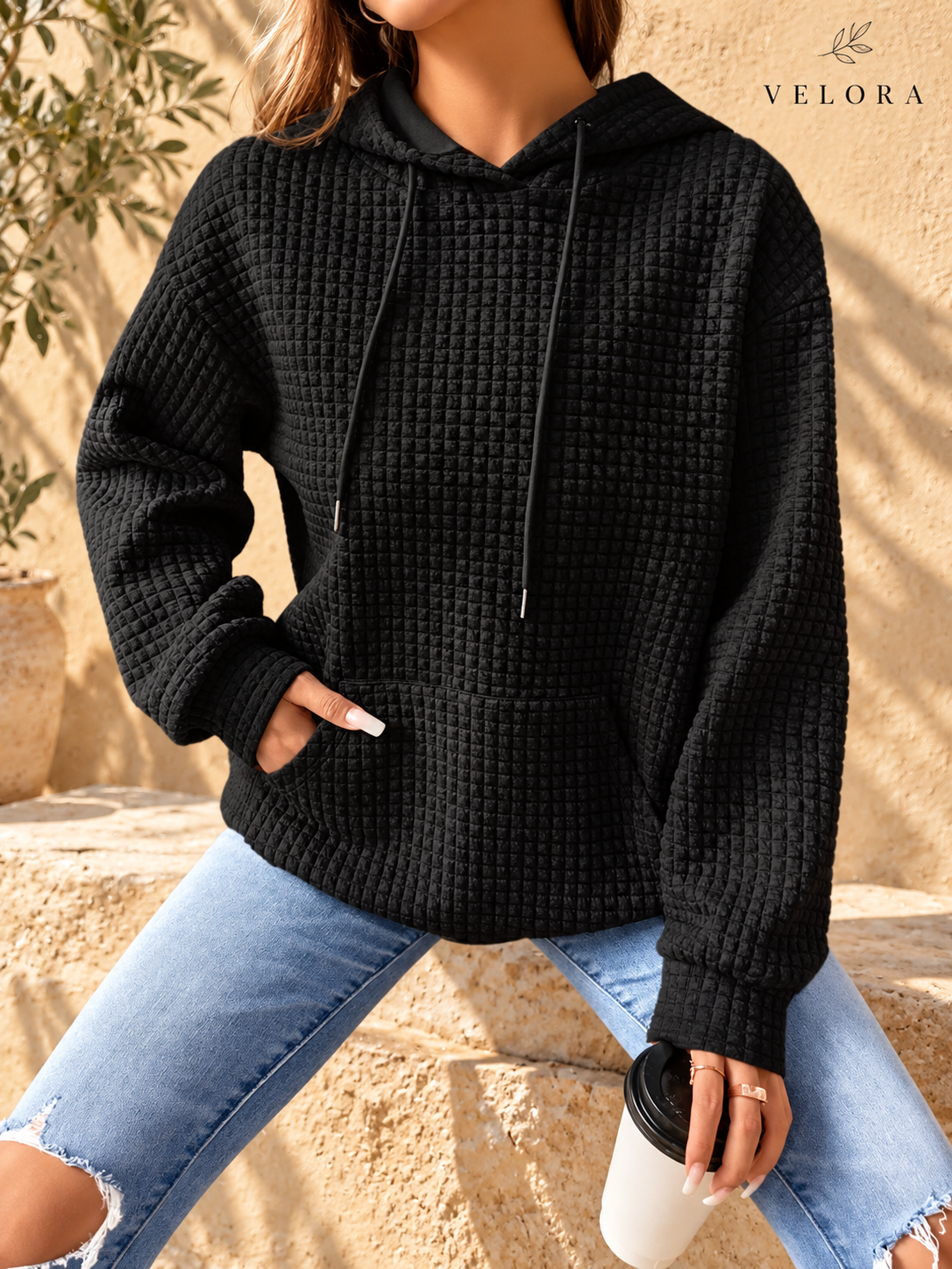 VELORA textured hoodie look 4 on warm Mediterranean plaster