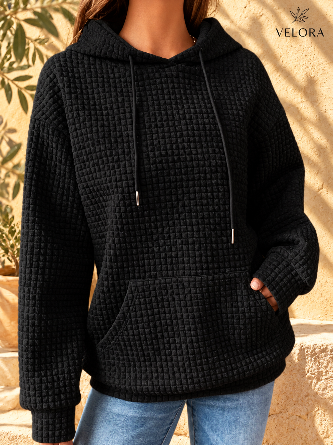 VELORA textured hoodie look 5 on warm Mediterranean plaster