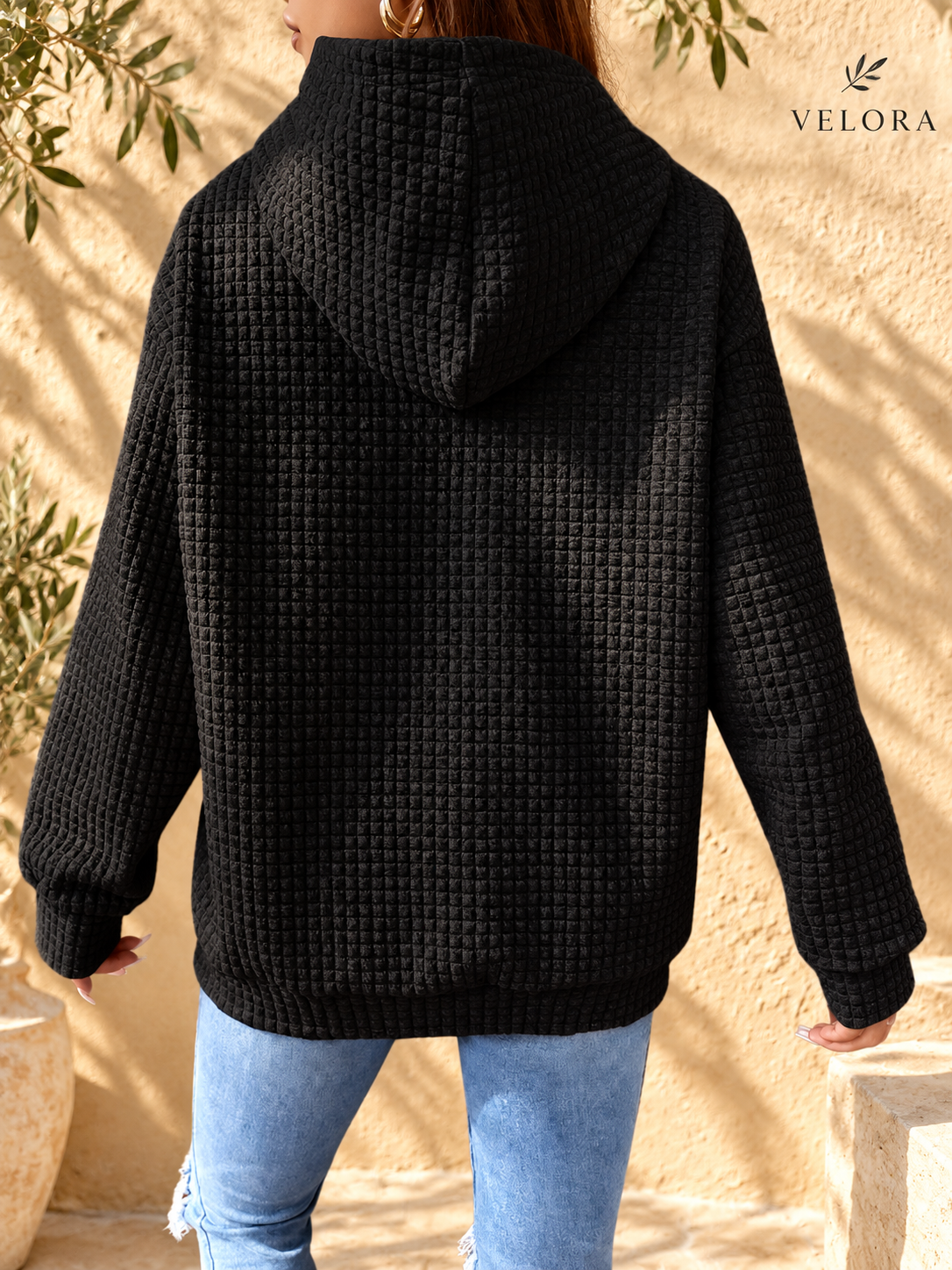 VELORA textured hoodie look 6 on warm Mediterranean plaster