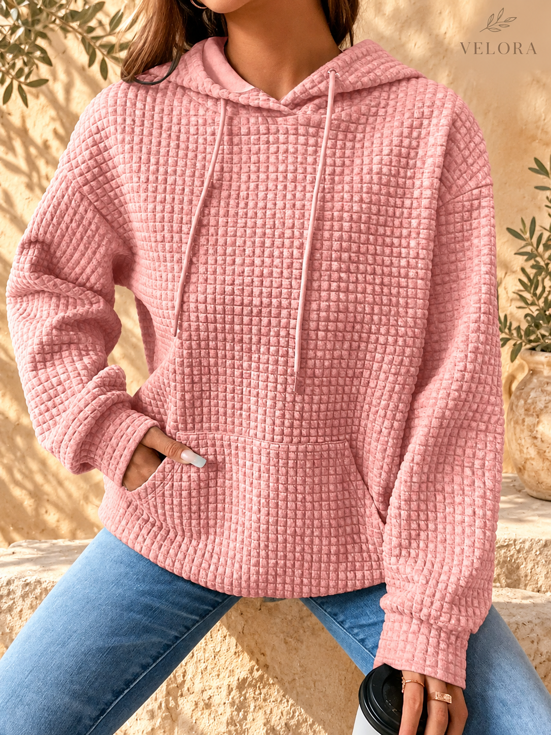 VELORA textured hoodie look 9 on warm Mediterranean plaster